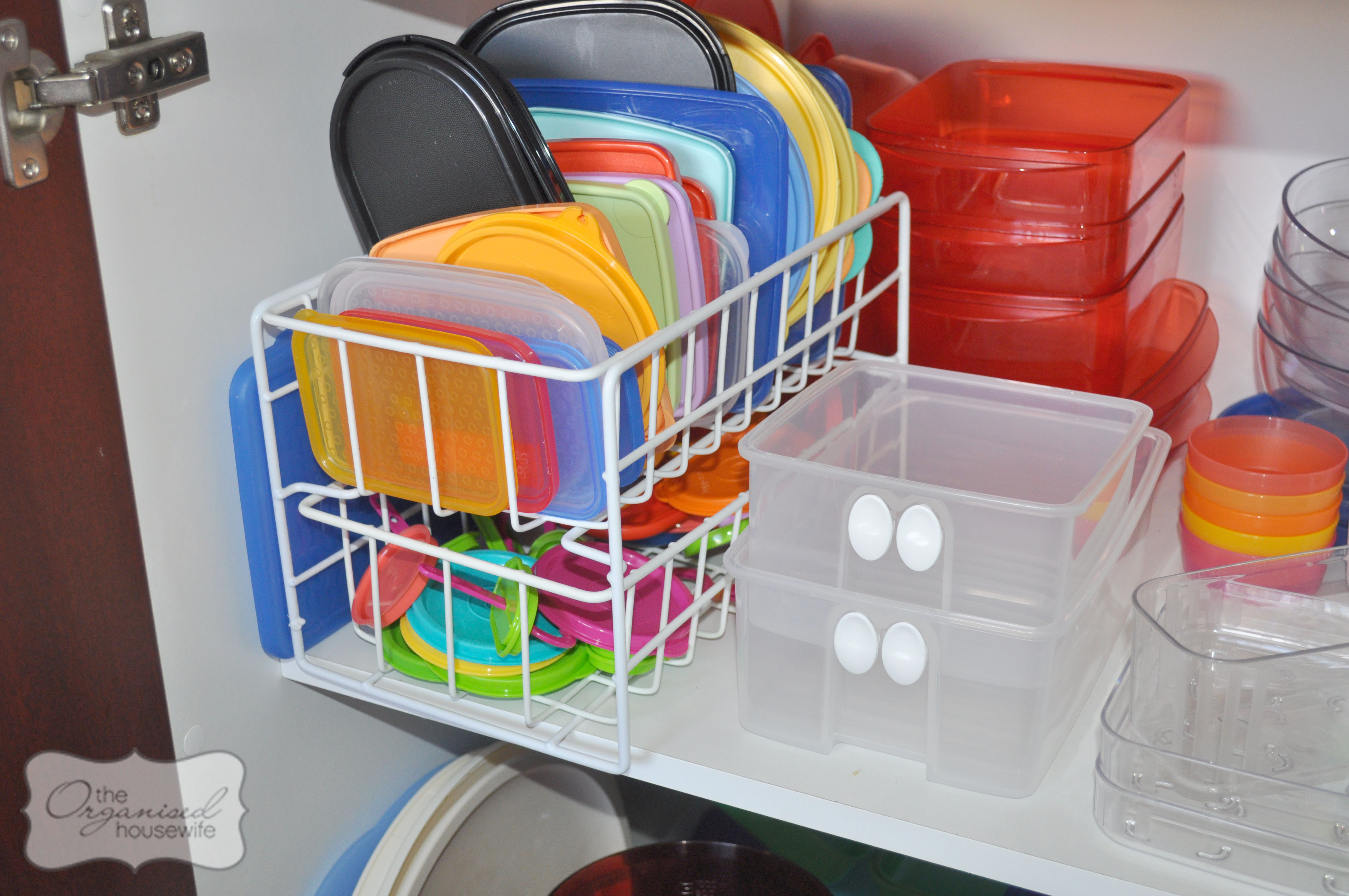 5 steps to an organised kitchen cupboard including the tupperware