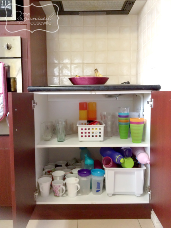 https://theorganisedhousewife.com.au/wp-content/uploads/2012/07/organising-cup-cupboard-2.jpg