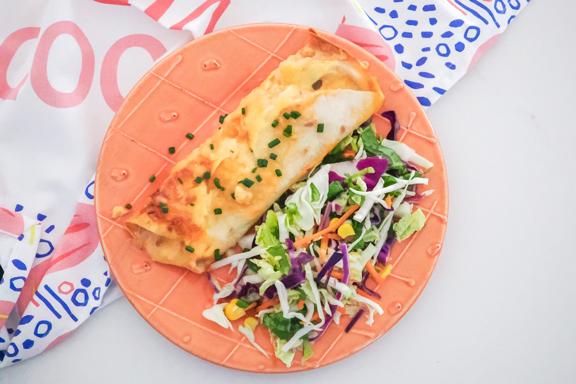 A long-time family favourite, these creamy and cheesy chicken enchiladas are so easy to make and perfect for a comforting weeknight dinner.