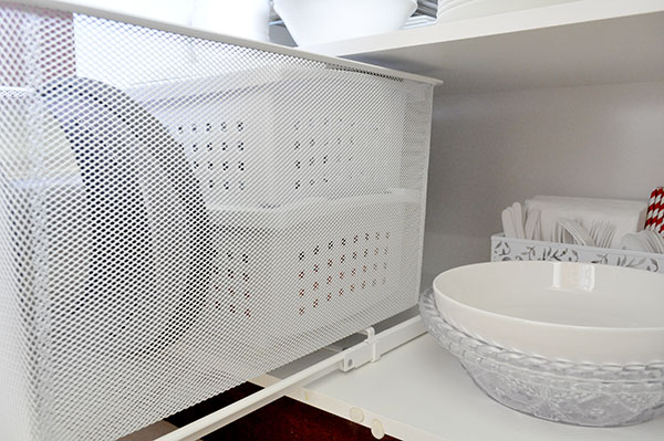 Organising the crockery cupboard and decluttering kitchen appliances ...