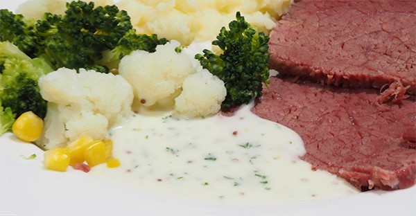 Corned beef with mustard parsley sauce