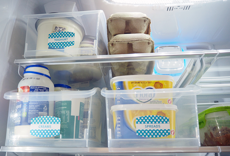 Organise the fridge to help keep it tidy, prevent food from spoiling, leftovers get eaten and it makes it easy to write a shopping list as I can quickly glance and see what I need to top up.