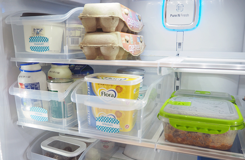 Organise the fridge to help keep it tidy, prevent food from spoiling, leftovers get eaten and it makes it easy to write a shopping list as I can quickly glance and see what I need to top up.