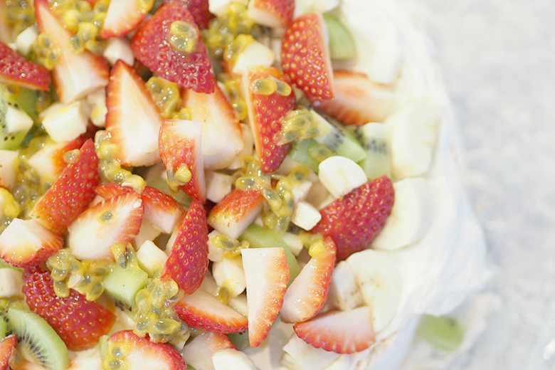 Pavlova is a light meringue dessert topped with whipped cream and fresh fruits. It's always a crowd pleaser and tastes amazing. It's crunchy on the outside but has a soft as marshmallow inside.