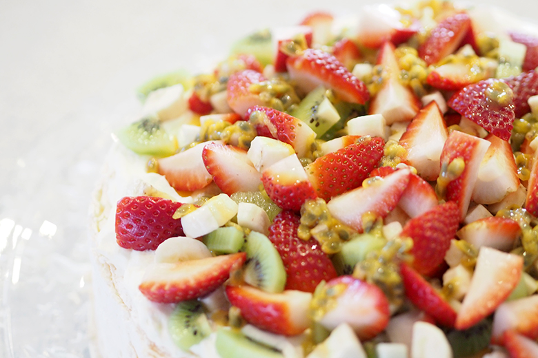 Pavlova is a light meringue dessert topped with whipped cream and fresh fruits. It's always a crowd pleaser and tastes amazing. It's crunchy on the outside but has a soft as marshmallow inside.