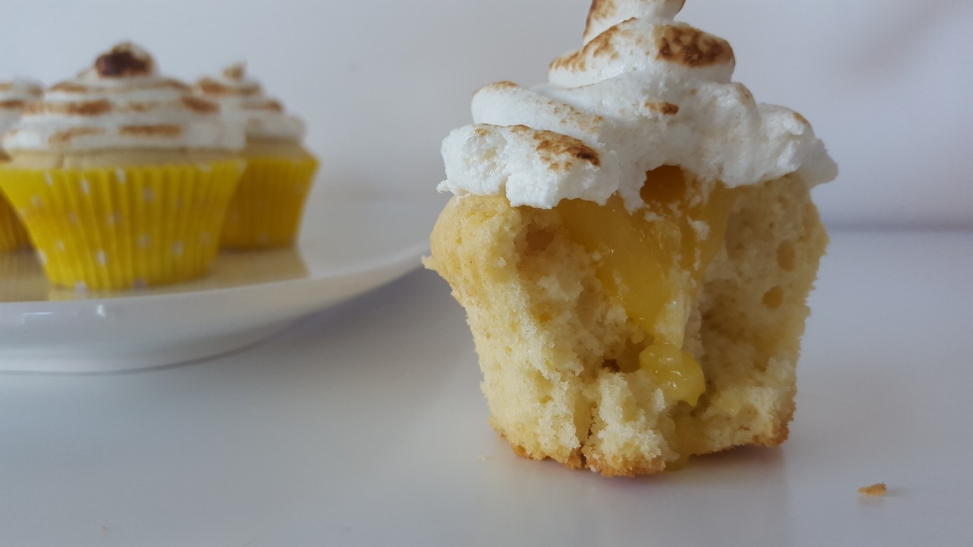 LEMON MERINGUE CUPCAKES - Think light lemon cupcakes filled with lemon curd and topped with a swirl of toasted meringue. If that thought delights you then you need this Lemon meringue cupcakes recipe.