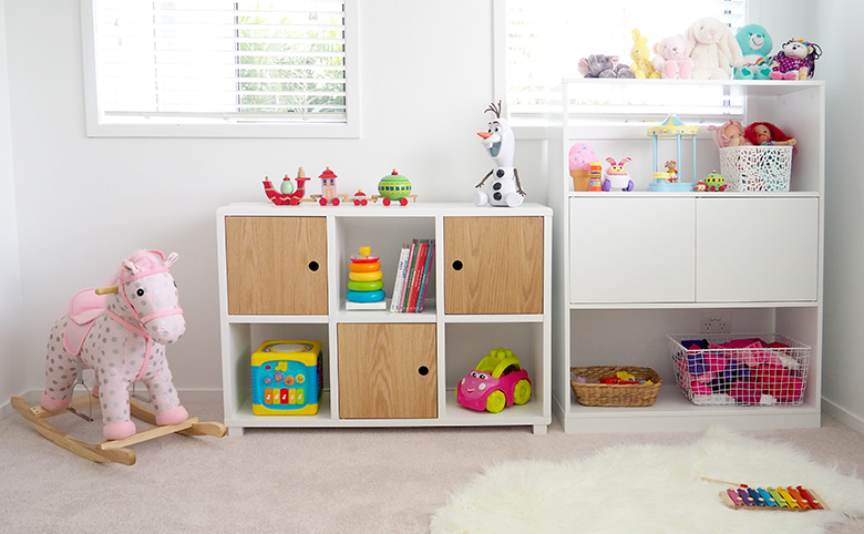 Sorting and organising children toys in bedroom