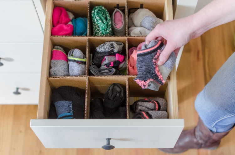 Recycle those cardboard boxes sitting in the garage into one of these awesome ideas - from genius storage solutions to projects for the kids.