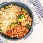 This easy spiced chicken stir fry with sesame and cashew rice is a quick, flavour-packed weeknight dinner. Customise with your favourite veggies – perfect for busy families!