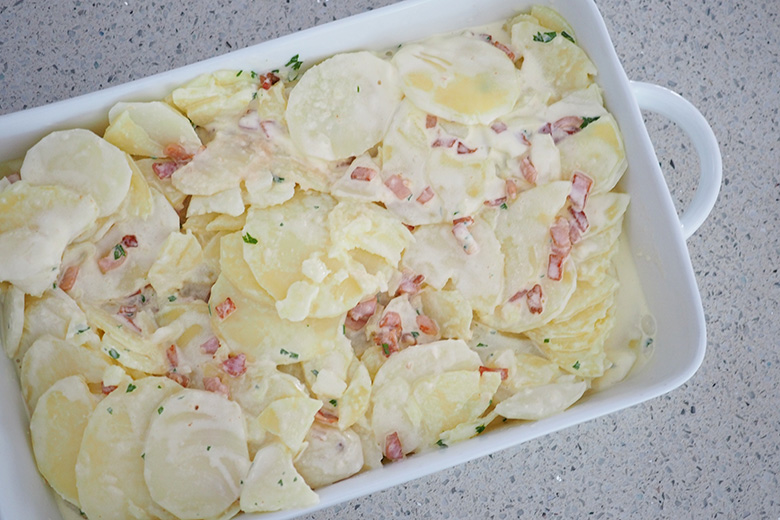 What is it about yummy food made out of potatoes that we just can’t say no to?! As Australia Day approaches, I’m planning some side dishes to have with our family BBQ at home and I’ll be making this ‘Creamy Potato Bake’ on the day. This No-Fail Creamy Potato Bake recipe is super simple and you won’t serve up hard, uncooked potatoes.