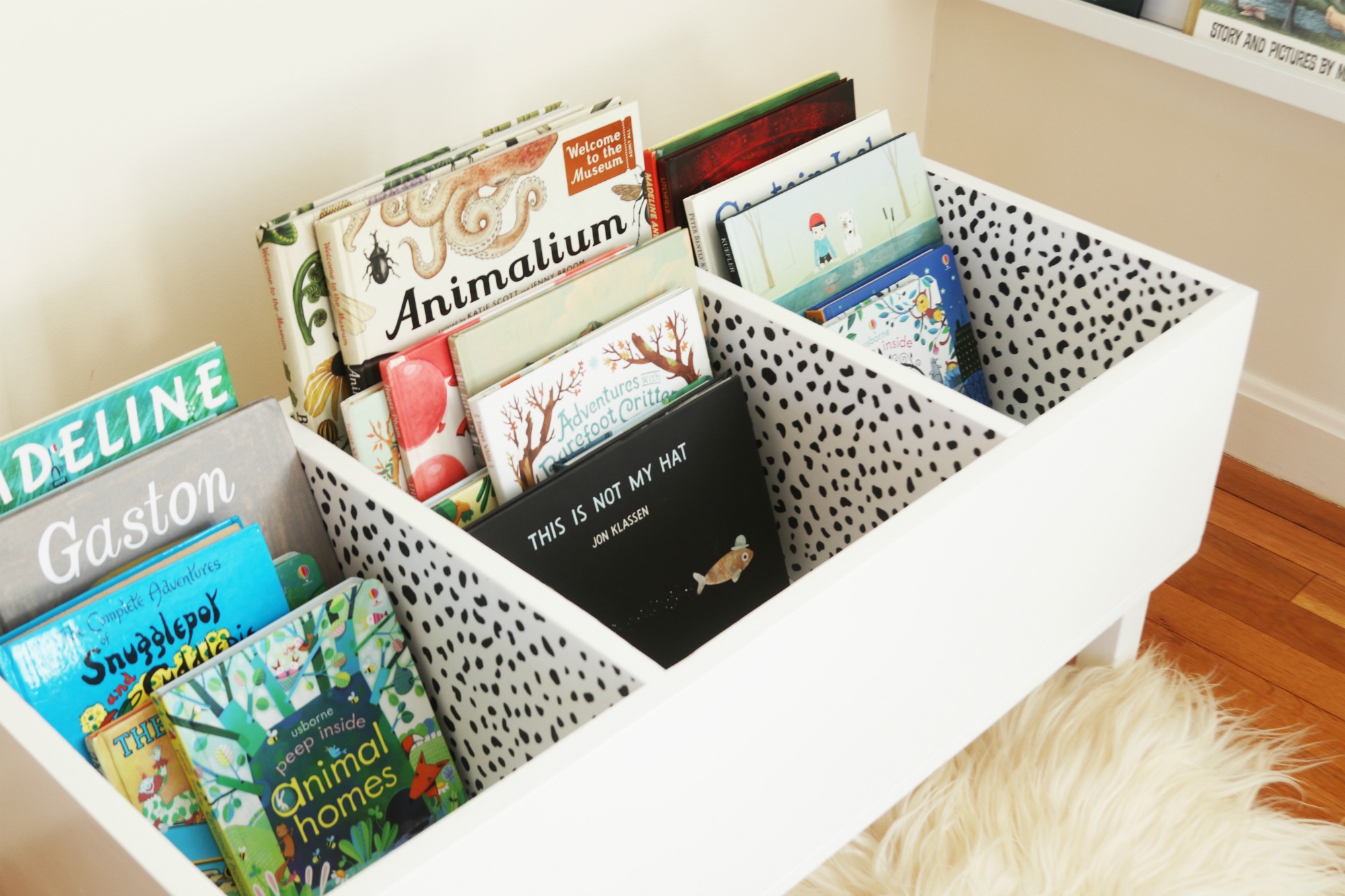 Book bucket for kids book storage idea
