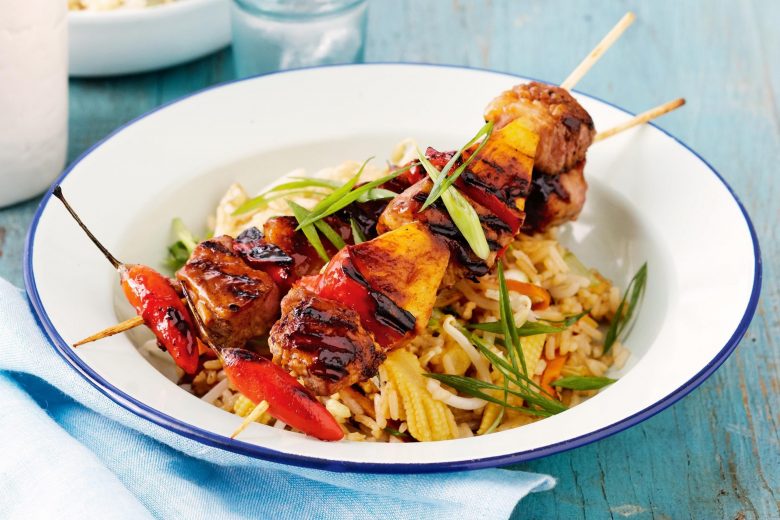 Sweet and sour pork kebabs with fried rice