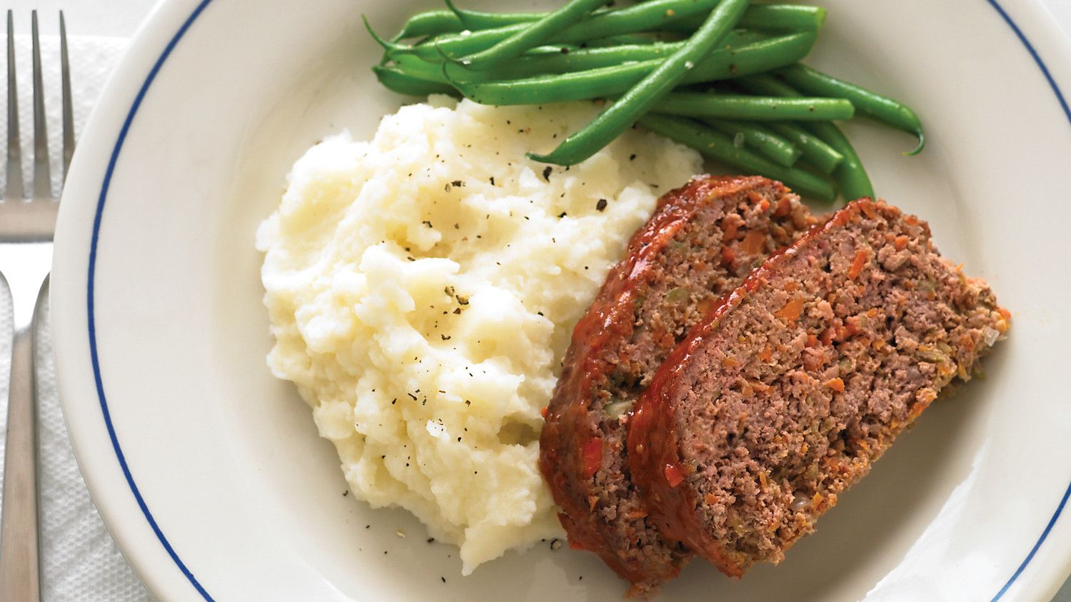 Meatloaf with beans and mashed potato