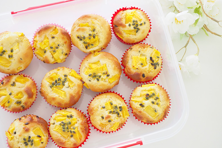 muffins with fresh mangoes and passionfruit seeds