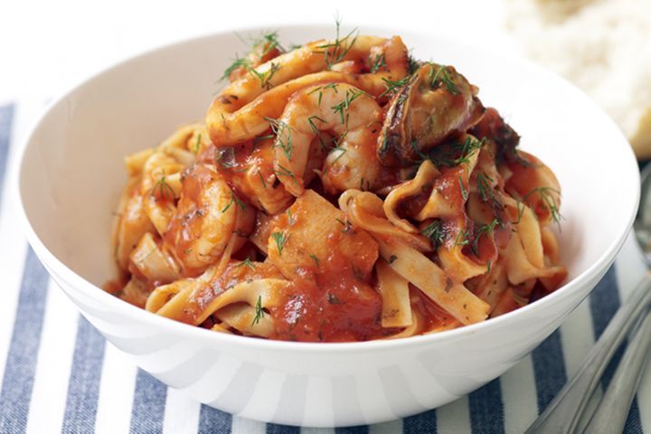 pasta with tomato sauce topped with parsley