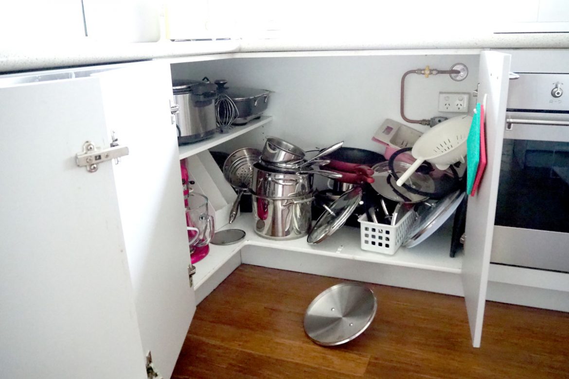 before photo of saucepan cupboard