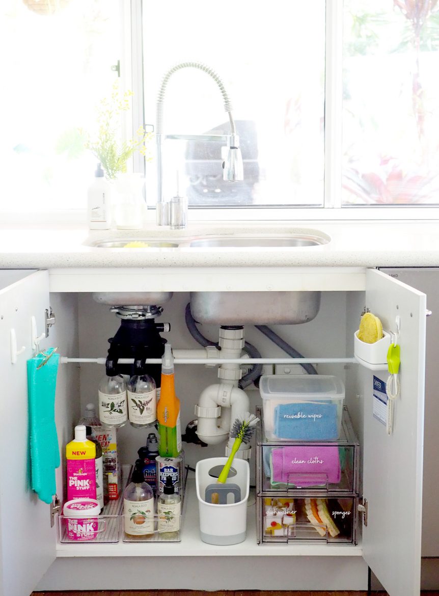 how to organise under the kitchen sink cupboard
