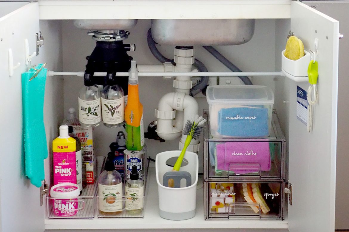 how to organise under the kitchen sink cupboard