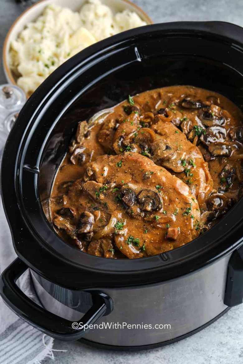 ndulge in a mouth-watering meal with our slow-cooker pork chops, which are guaranteed to be tender and juicy. Complete with a creamy mushroom and onion gravy, this easy recipe requires minimal prep time, making it a perfect choice for busy weeknights.